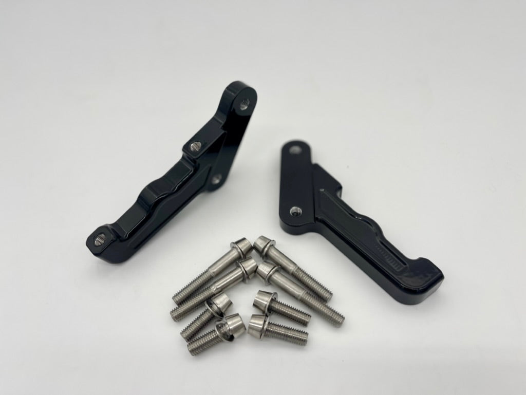 Front radial caliper mount for HD Softail 19-Up